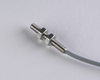 NIS04324 - 7 - Indukčný snímač M4 L=25 mm kábel 3m PNP NC Sn = 1 mm